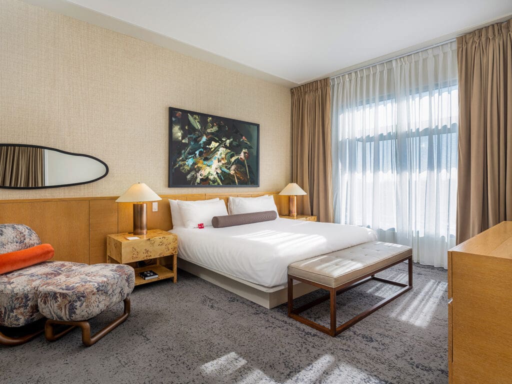 21c Museum Hotel Bentonville suite with living area and original artwork