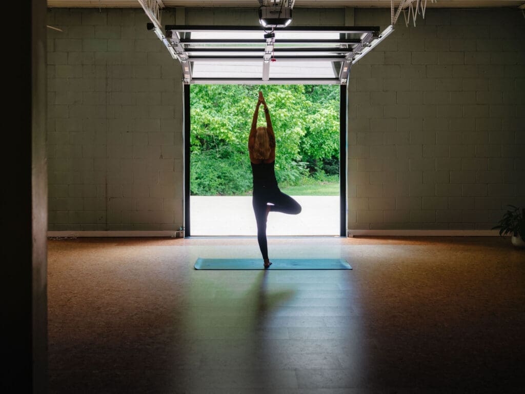 yoga, studio prayer pose (Trailside Yoga) Lululemon yoga ambassador meditating at Trailside Yoga Fayetteville, commercial photographer