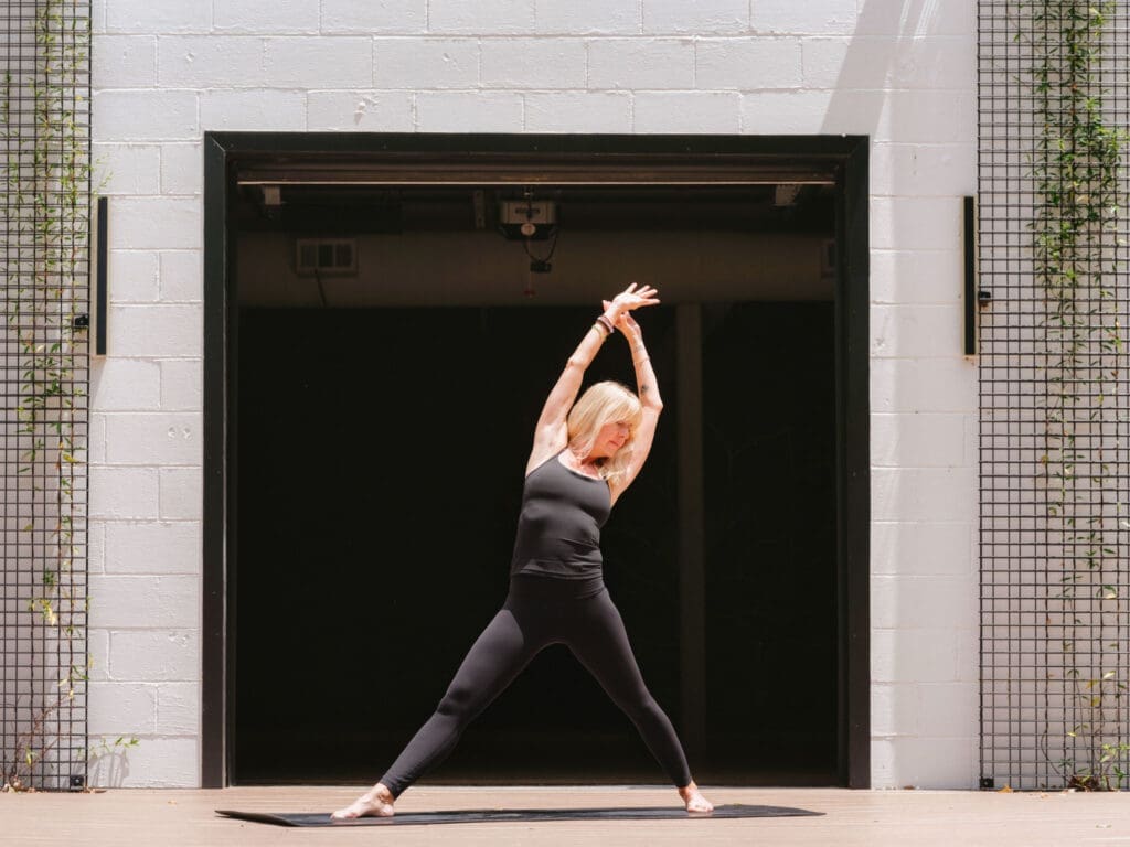 yoga, studio prayer pose (Trailside Yoga) Lululemon yoga ambassador meditating at Trailside Yoga Fayetteville, commercial photographer