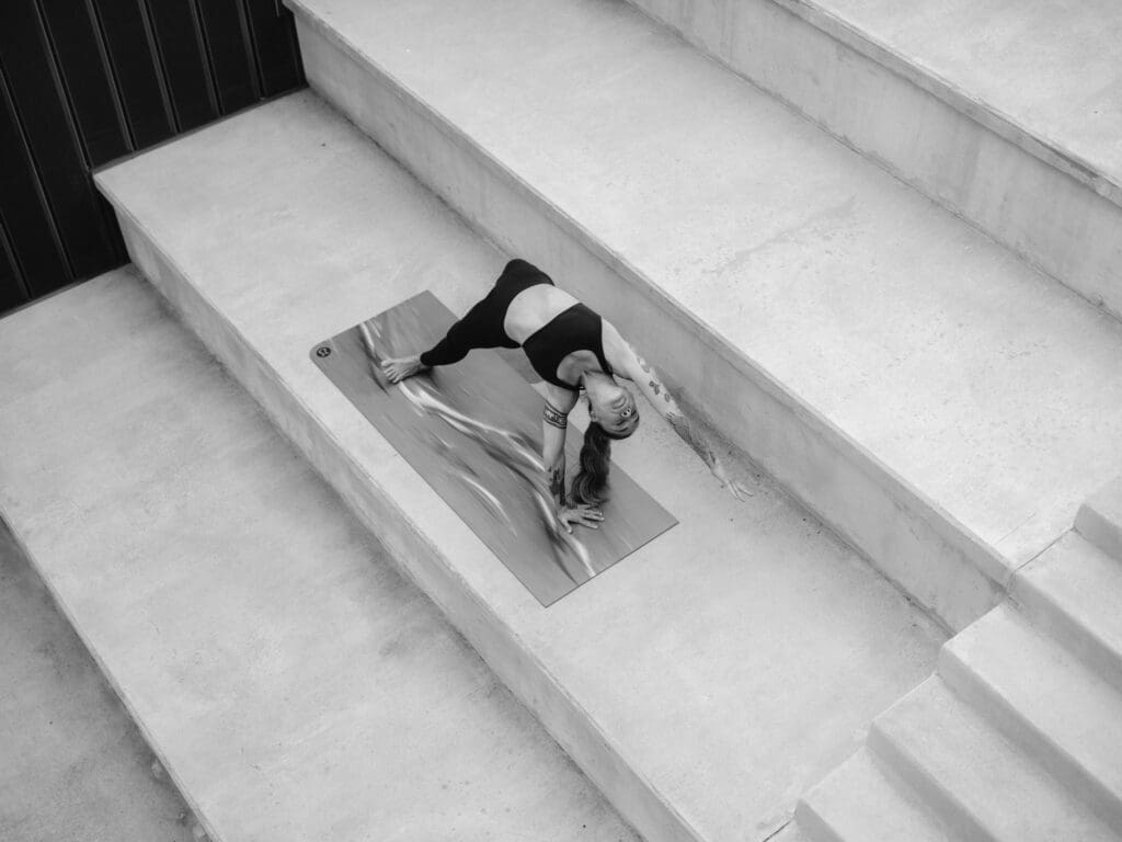 yoga, studio prayer pose (the ledger) Lululemon yoga ambassador meditating at the ledger bentonville, commercial photographer