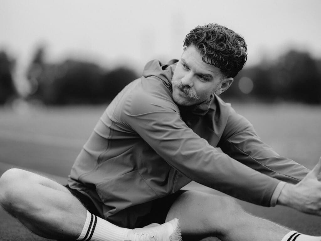 runner lacing up (Old Tiger Track) Lululemon runner lacing up at Old Tiger Track Bentonville, NWA brand photography